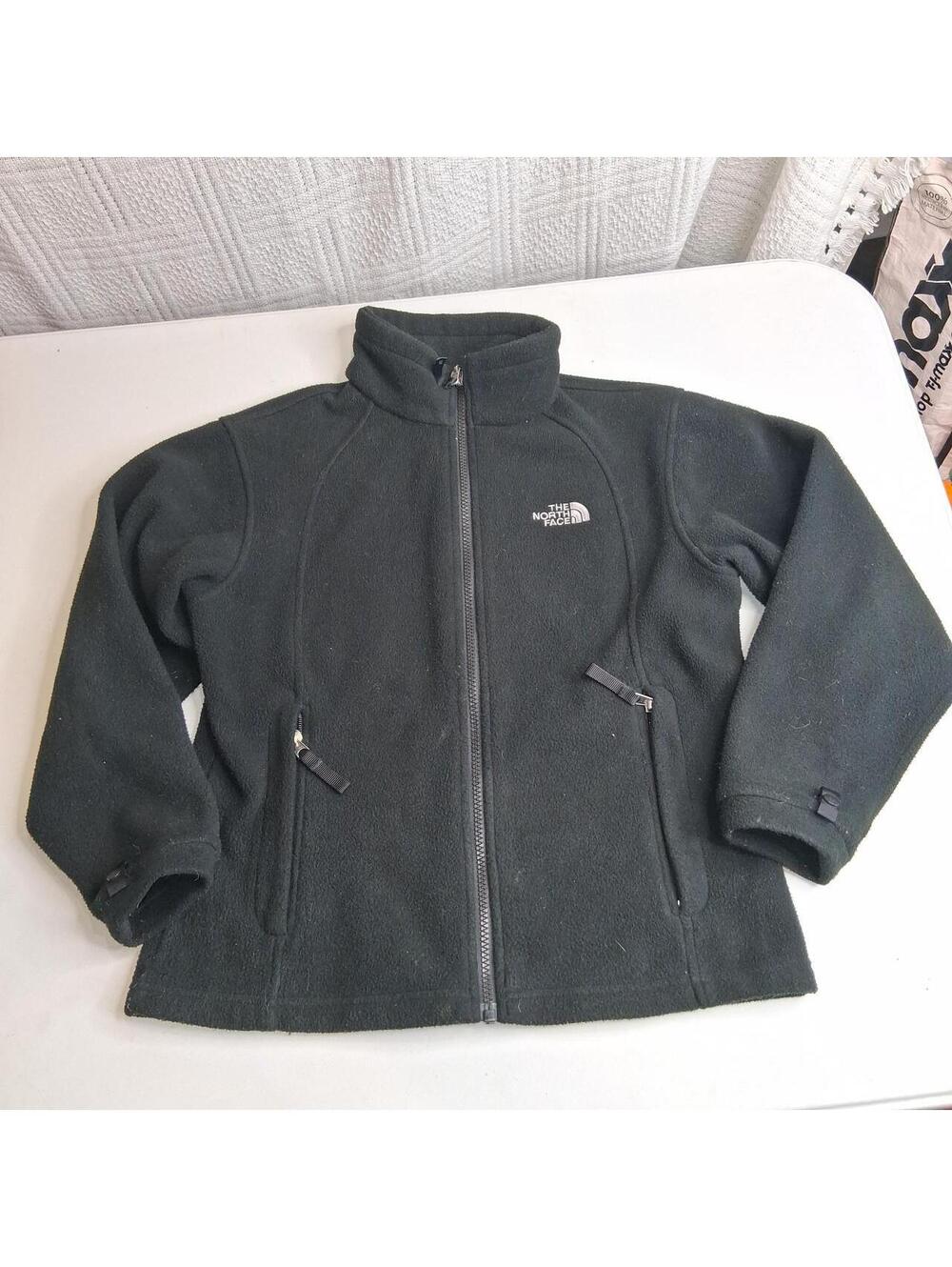 The North Face black fleece jacket in size girls M